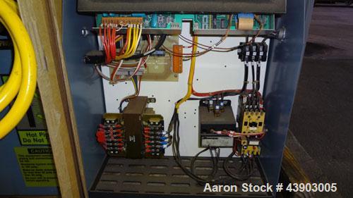 Used AEC Water Temperature Control Unit, Model TDW-1XT.  9 kW Heater, maximum temperature rating 230 degrees F. Includes an AEC Micro-Computer panel. 3/60/460 Volt. Mounted on casters.