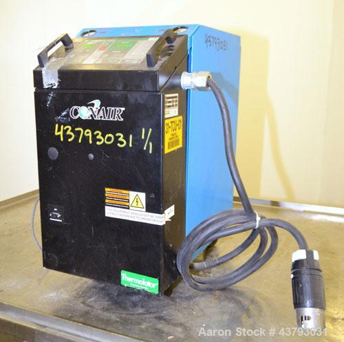 Used Conair Thermolator Water Temperature Controller, Model TW-2. 24 Kw heater, operating temperature range 35 to 250 degrees F. 3/60/460 Volt, 32 amps. Includes a TW-2 Microprocessor controller. Mou...