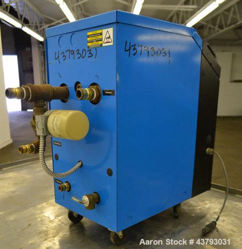 Used Conair Thermolator Water Temperature Controller, Model TW-2. 24 Kw heater, operating temperature range 35 to 250 degrees F. 3/60/460 Volt, 32 amps. Includes a TW-2 Microprocessor controller. Mou...