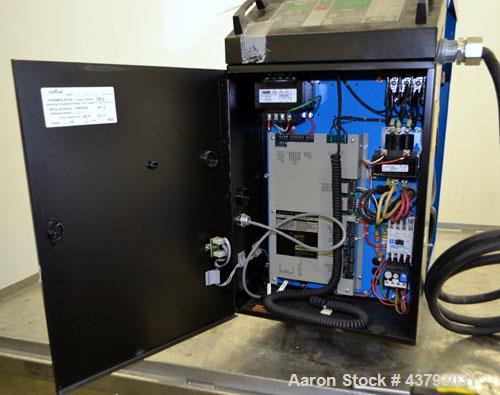 Used Conair Thermolator Water Temperature Controller, Model TW-2. 24 Kw heater, operating temperature range 35 to 250 degrees F. 3/60/460 Volt, 32 amps. Includes a TW-2 Microprocessor controller. Mou...