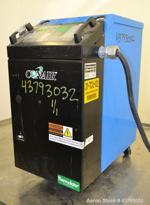 Used Conair Thermolator Water Temperature Controller, Model TW-2. 24 Kw heater, operating temperature range 35 to 250 degrees F. 3/60/460 Volt, 32 amps. Includes a TW-2 Microprocessor controller. Mou...