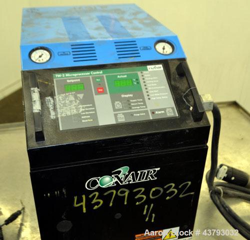 Used Conair Thermolator Water Temperature Controller, Model TW-2. 24 Kw heater, operating temperature range 35 to 250 degrees F. 3/60/460 Volt, 32 amps. Includes a TW-2 Microprocessor controller. Mou...