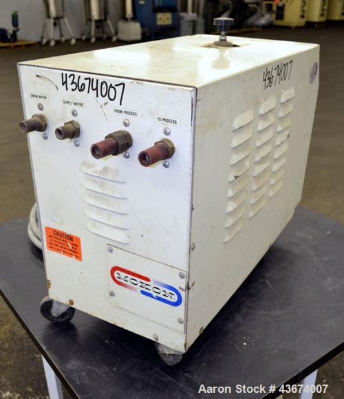 Used Mocon Leak-Master Negative Pressure System, Model NP1000-02. Designed to stop leaks in molds and processes without stopping production. 1/2hp pump (housing cracked), flow rate 9 gallons per minu...