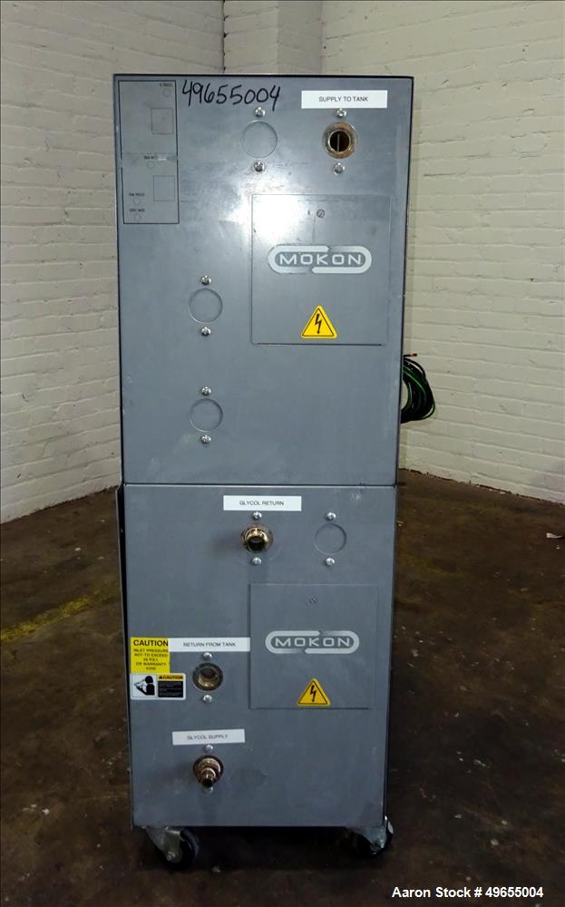 Used Mokon Duratherm Circulating Water Temperature Control System, Model DT4336HT. 36 KW, 3/60/460 volts. Maximum temperature 250 degrees F. Includes a control panel with a Eurotherm 2204E controller...