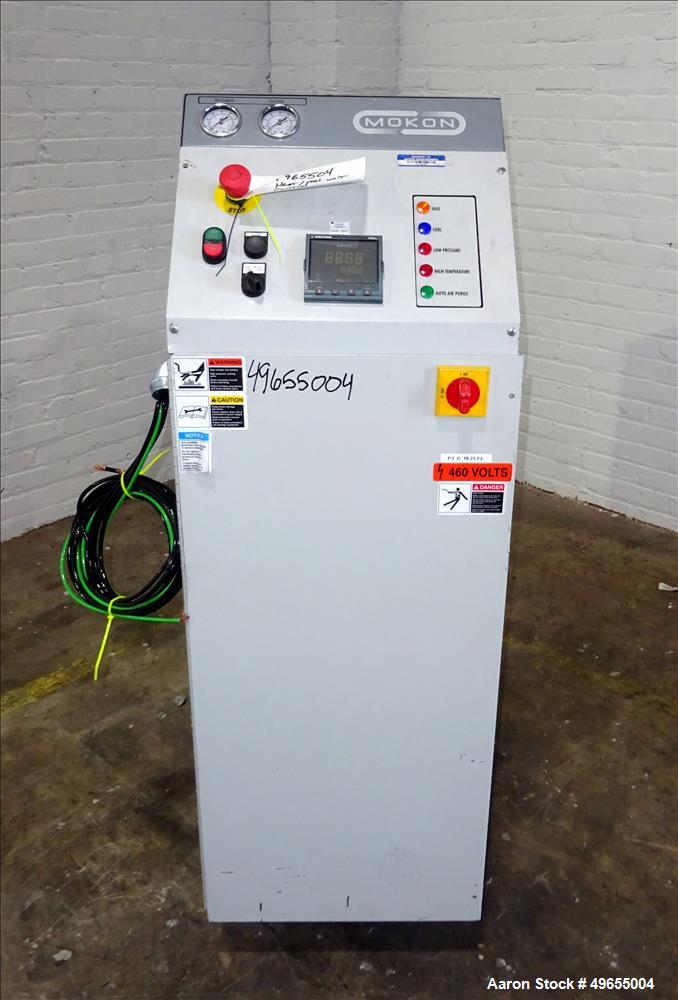 Used Mokon Duratherm Circulating Water Temperature Control System, Model DT4336HT. 36 KW, 3/60/460 volts. Maximum temperature 250 degrees F. Includes a control panel with a Eurotherm 2204E controller...