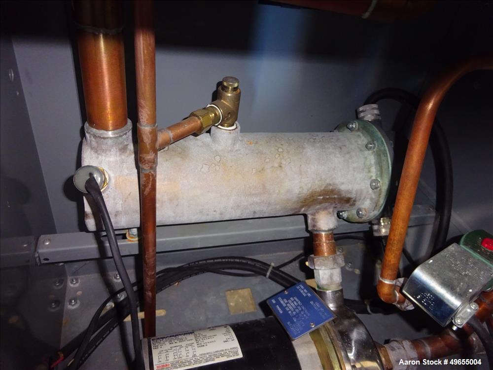 Used Mokon Duratherm Circulating Water Temperature Control System, Model DT4336HT. 36 KW, 3/60/460 volts. Maximum temperature 250 degrees F. Includes a control panel with a Eurotherm 2204E controller...