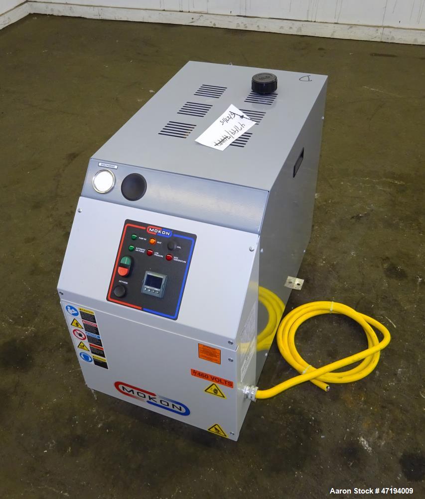 Unused- Mokon Minitherm Circulating Water Temperature Control System, Model MT4002AG. 2KW, 3/60/460 volts. Maximum temperature 250 degrees F. Includes a control panel with a Eurotherm controller. Ser...