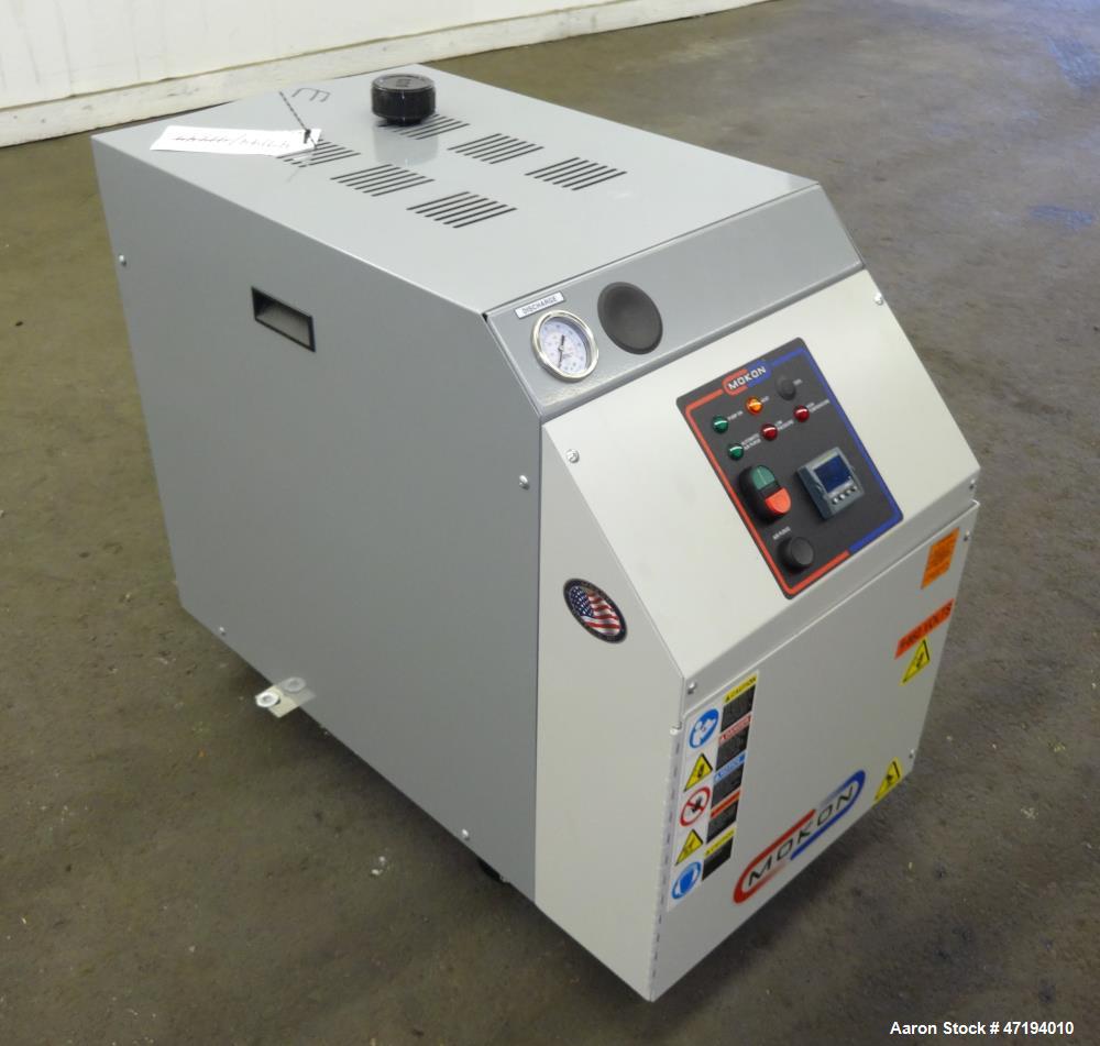 Unused- Mokon Minitherm Circulating Water Temperature Control System, Model MT4002AG. 2KW, 3/60/460 volts. Maximum temperature 250 degrees F. Includes a control panel with a Eurotherm controller. Ser...