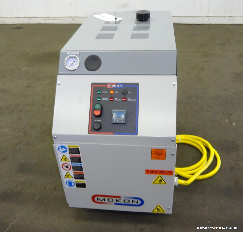 Unused- Mokon Minitherm Circulating Water Temperature Control System, Model MT4002AG. 2KW, 3/60/460 volts. Maximum temperature 250 degrees F. Includes a control panel with a Eurotherm controller. Ser...
