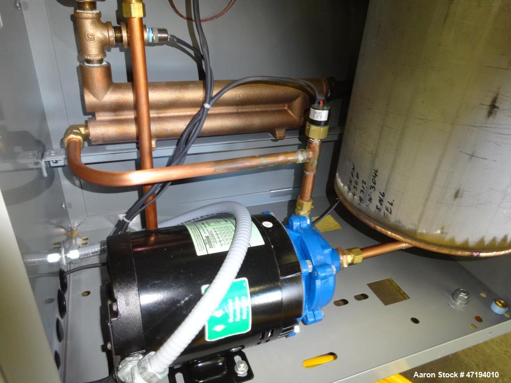 Unused- Mokon Minitherm Circulating Water Temperature Control System, Model MT4002AG. 2KW, 3/60/460 volts. Maximum temperature 250 degrees F. Includes a control panel with a Eurotherm controller. Ser...
