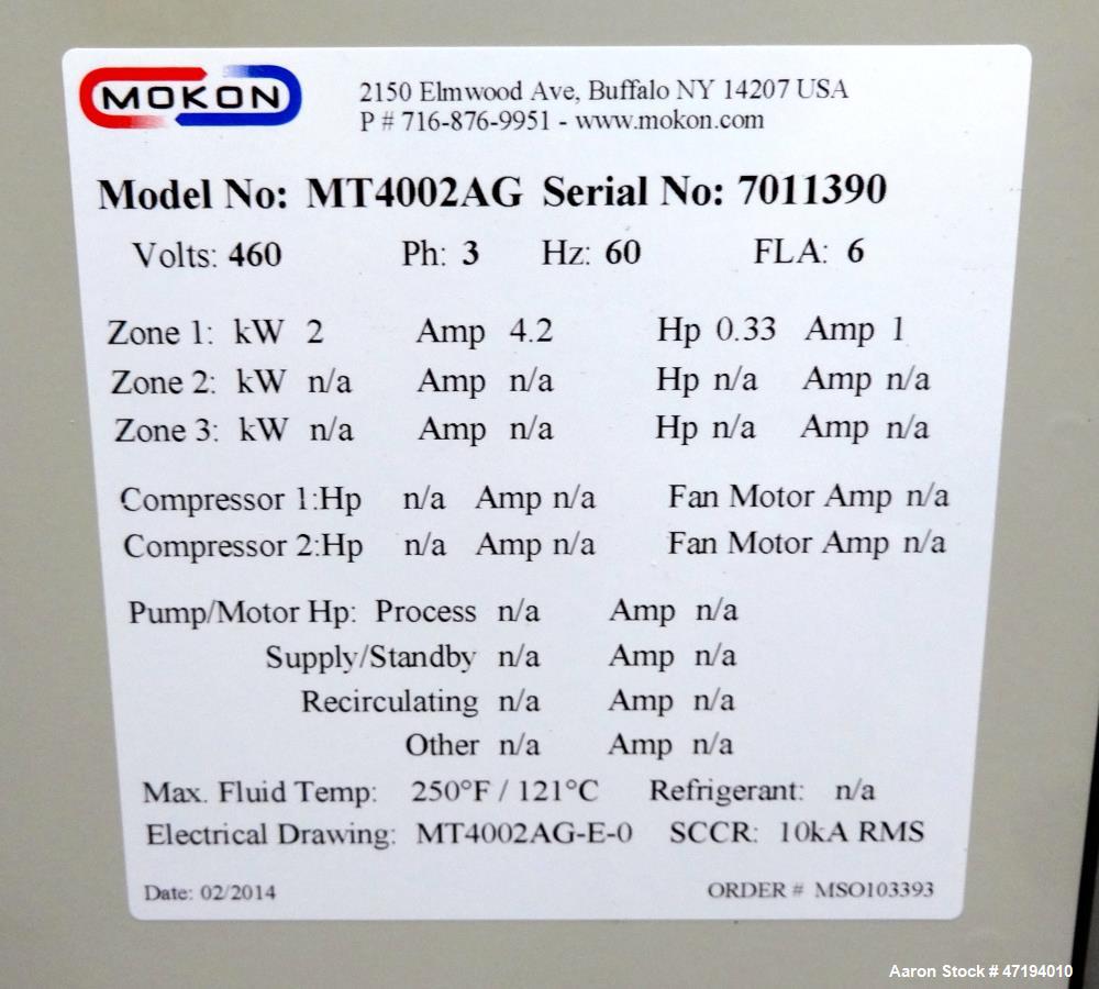 Unused- Mokon Minitherm Circulating Water Temperature Control System, Model MT4002AG. 2KW, 3/60/460 volts. Maximum temperature 250 degrees F. Includes a control panel with a Eurotherm controller. Ser...