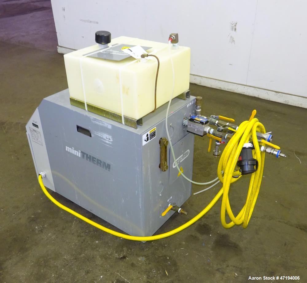 Used Mokon Minitherm Circulating Water Temperature Control System, Model MT430234. 2KW, 3/60/460 volts. Maximum temperature 200 degrees F. Includes a control panel with a Eurotherm controller. Serial...