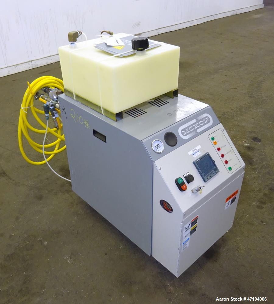 Used Mokon Minitherm Circulating Water Temperature Control System, Model MT430234. 2KW, 3/60/460 volts. Maximum temperature 200 degrees F. Includes a control panel with a Eurotherm controller. Serial...