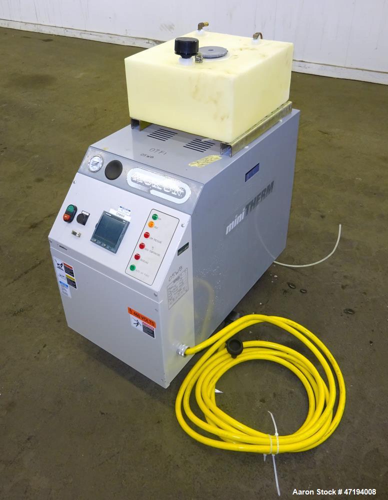 Used Mokon Minitherm Circulating Water Temperature Control System, Model MT430234. 2KW, 3/60/460 volts. Maximum temperature 200 degrees F. Includes a control panel with a Eurotherm controller. Serial...