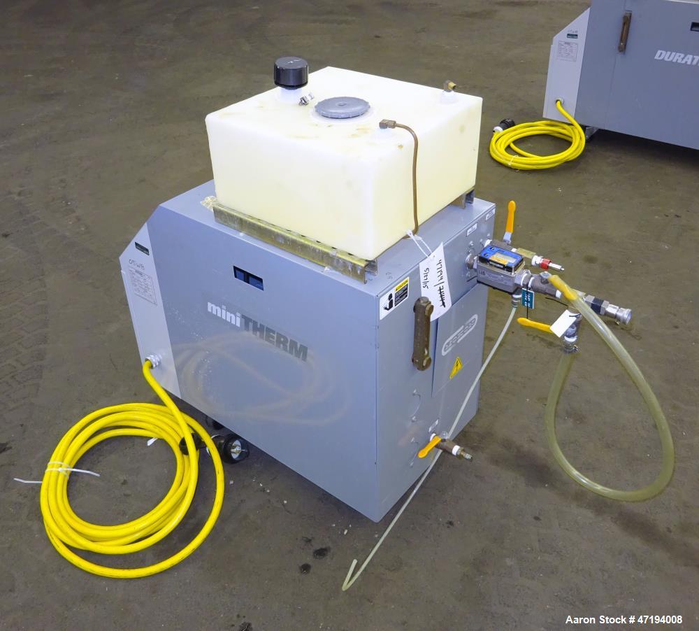 Used Mokon Minitherm Circulating Water Temperature Control System, Model MT430234. 2KW, 3/60/460 volts. Maximum temperature 200 degrees F. Includes a control panel with a Eurotherm controller. Serial...