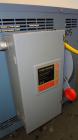 Used AEC Water Temperature Control Unit, Model TDW-1XT.  9 kW Heater, maximum temperature rating 230 degrees F. Includes an AEC Micro-Computer panel. 3/60/460 Volt. Mounted on casters.