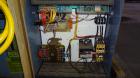 Used AEC Water Temperature Control Unit, Model TDW-1XT.  9 kW Heater, maximum temperature rating 230 degrees F. Includes an AEC Micro-Computer panel. 3/60/460 Volt. Mounted on casters.