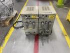 Used Conair Temperature Controller, Model TC2-DI. 9kW each, 18kW total. Operating temperature 32 to 250 Degrees F. Pumps 3/4hp. 3/60/460 volt, 30 amp. Mounted on casters. Serial# 92G129.