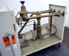 Used Mocon Leak-Master Negative Pressure System, Model NP1000-02. Designed to stop leaks in molds and processes without stopping production. 1/2hp pump (housing cracked), flow rate 9 gallons per minu...