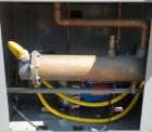 Used Mokon Duratherm Water Temperature Controller, Model DR4C48-M5. Single zone, 48 total KW. Maximum temperature 250 deg F. 3/60/460 volt, Eurotherm 2204E controller. Built 2000.