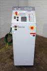 Used Mokon Duratherm Circulating Water Temperature Control System, Model DT4336HT. 36 KW, 3/60/460 volts. Maximum temperature 250 degrees F. Includes a control panel with a Eurotherm 2204E controller...