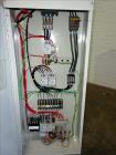 Used Mokon Duratherm Circulating Water Temperature Control System, Model DT4336HT. 36 KW, 3/60/460 volts. Maximum temperature 250 degrees F. Includes a control panel with a Eurotherm 2204E controller...