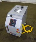 Unused- Mokon Minitherm Circulating Water Temperature Control System, Model MT4002AG. 2KW, 3/60/460 volts. Maximum temperature 250 degrees F. Includes a control panel with a Eurotherm controller. Ser...