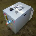 Unused- Mokon Minitherm Circulating Water Temperature Control System, Model MT4002AG. 2KW, 3/60/460 volts. Maximum temperature 250 degrees F. Includes a control panel with a Eurotherm controller. Ser...