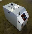 Unused- Mokon Minitherm Circulating Water Temperature Control System, Model MT4002AG. 2KW, 3/60/460 volts. Maximum temperature 250 degrees F. Includes a control panel with a Eurotherm controller. Ser...