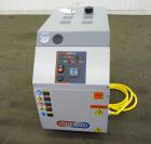 Unused- Mokon Minitherm Circulating Water Temperature Control System, Model MT4002AG. 2KW, 3/60/460 volts. Maximum temperature 250 degrees F. Includes a control panel with a Eurotherm controller. Ser...