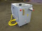 Unused- Mokon Minitherm Circulating Water Temperature Control System, Model MT4002AG. 2KW, 3/60/460 volts. Maximum temperature 250 degrees F. Includes a control panel with a Eurotherm controller. Ser...