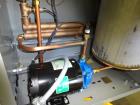 Unused- Mokon Minitherm Circulating Water Temperature Control System, Model MT4002AG. 2KW, 3/60/460 volts. Maximum temperature 250 degrees F. Includes a control panel with a Eurotherm controller. Ser...