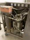 Used Sterlco Portable Water Temperature Control Unit, Model M2B2010-D.  1 HP Pump, 35 GPM, 150 PSI Max Working Pressure, 9 kW Heater, 32-250 Degrees F Setpoint Operating Range.  3/60/208 Volt.  Seria...