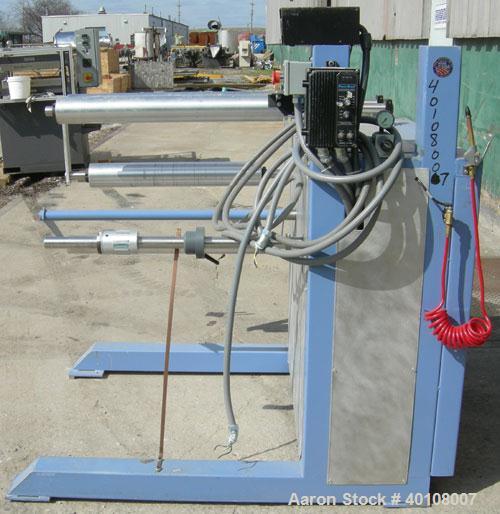 Used:Chase Machine and Engineering rewind unit. Single station. Approximately 30" wide capacity. Driven by a 3/4hp,180 volt, 1725 rpm DC motor with reducer,ratio 60 to 1, and DC motor controller.