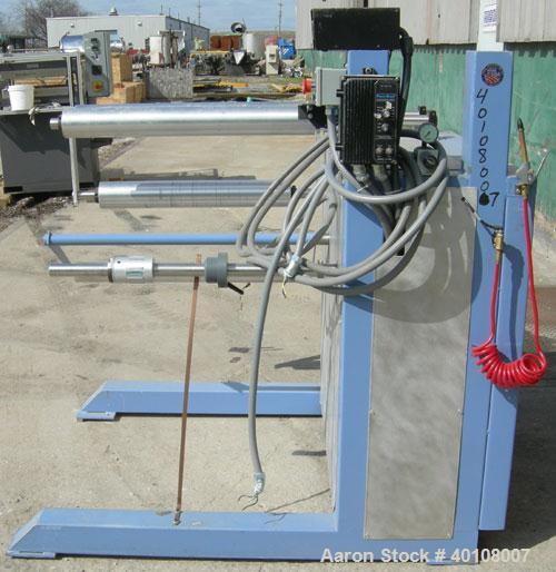 Used:Chase Machine and Engineering rewind unit. Single station. Approximately 30" wide capacity. Driven by a 3/4hp,180 volt,...