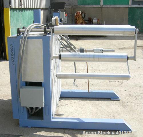 Used:Chase Machine and Engineering rewind unit. Single station. Approximately 30" wide capacity. Driven by a 3/4hp,180 volt,...