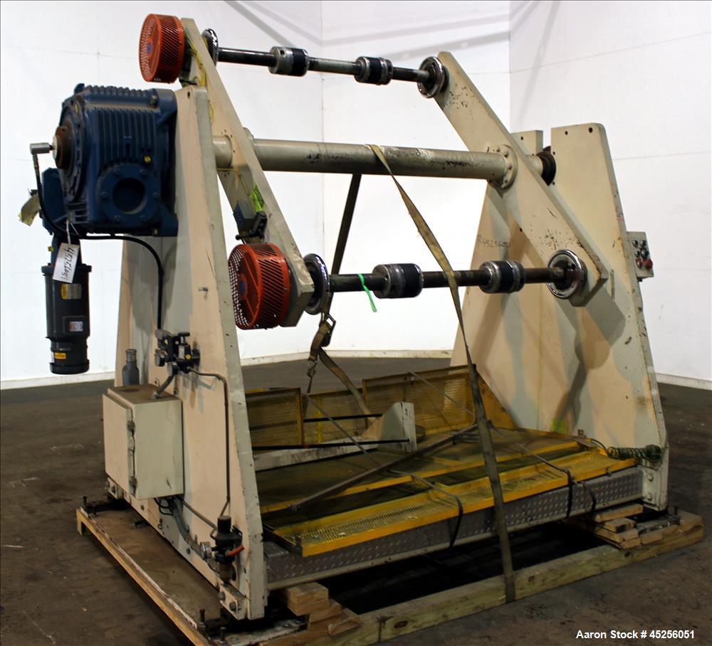 Used Dri-Tec Single Turret Dual Station Winder. Approximate 52" wide x 48" diameter roll capacity. Driven by a 5 hp, 3/208-230/460 volt, 1725 rpm gear motor, 1800 to 1 ratio.  Serial# 2413.