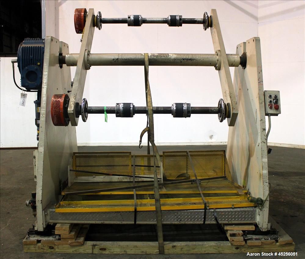 Used Dri-Tec Single Turret Dual Station Winder. Approximate 52" wide x 48" diameter roll capacity. Driven by a 5 hp, 3/208-230/460 volt, 1725 rpm gear motor, 1800 to 1 ratio.  Serial# 2413.