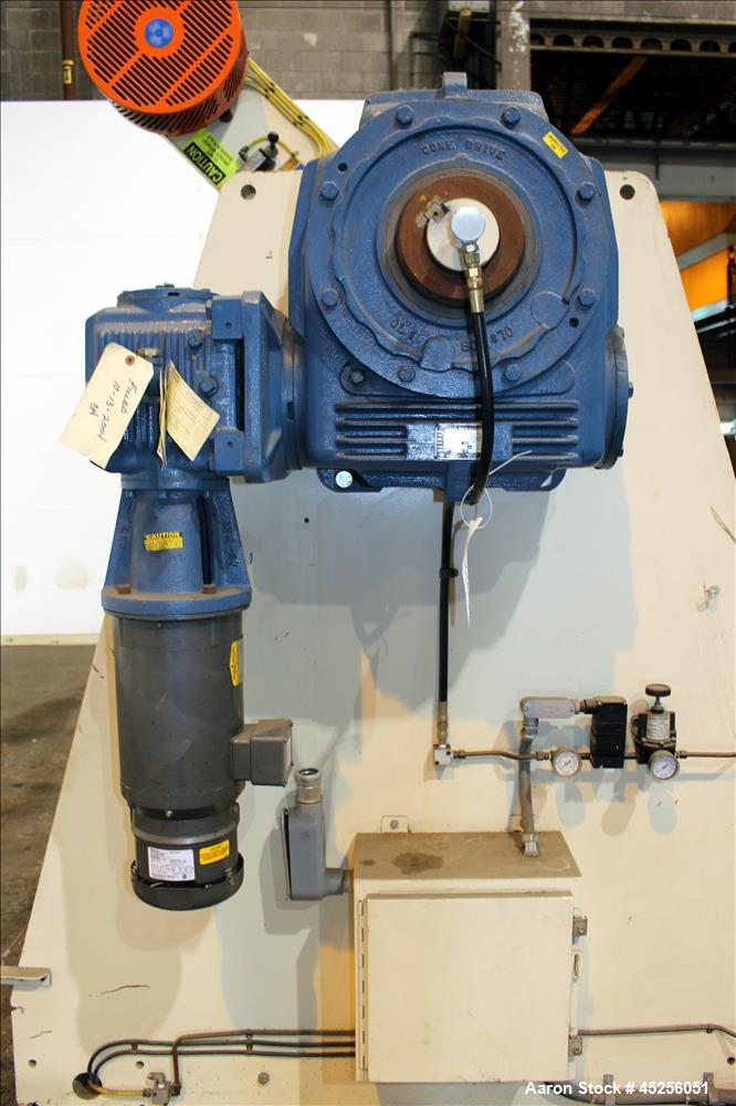 Used Dri-Tec Single Turret Dual Station Winder. Approximate 52" wide x 48" diameter roll capacity. Driven by a 5 hp, 3/208-230/460 volt, 1725 rpm gear motor, 1800 to 1 ratio.  Serial# 2413.