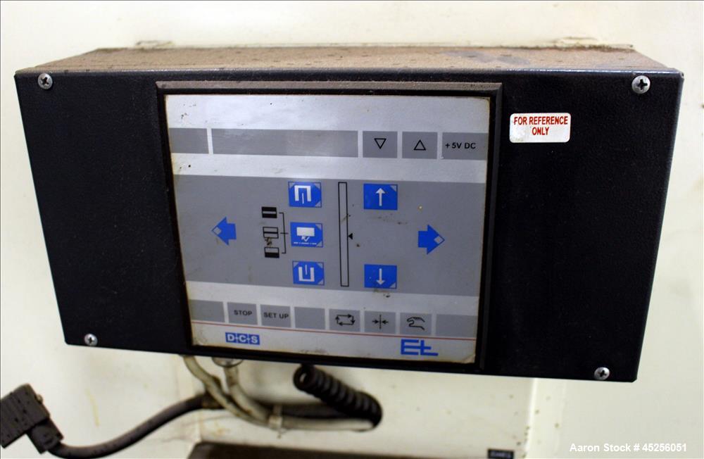 Used Dri-Tec Single Turret Dual Station Winder. Approximate 52" wide x 48" diameter roll capacity. Driven by a 5 hp, 3/208-230/460 volt, 1725 rpm gear motor, 1800 to 1 ratio.  Serial# 2413.