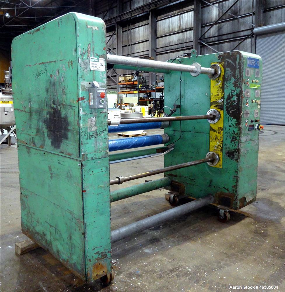 Used Fixed position winder, approximate (2) 74" x 6" diameter rolls driven by 2 hp, 180 volt, 1540 rpm motors with 30:1 gearbox ratio,  (2) 70" x 2", (1) 70" x 3" diameter driven by 2 hp, 180 volt, 1...