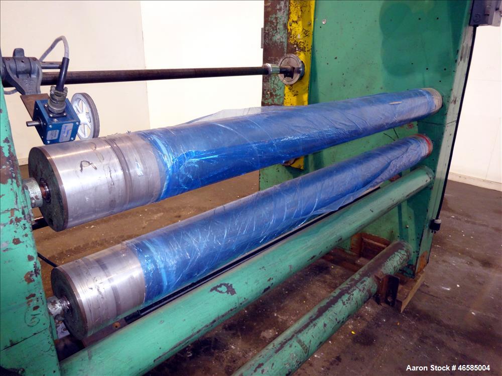 Used Fixed position winder, approximate (2) 74" x 6" diameter rolls driven by 2 hp, 180 volt, 1540 rpm motors with 30:1 gearbox ratio,  (2) 70" x 2", (1) 70" x 3" diameter driven by 2 hp, 180 volt, 1...