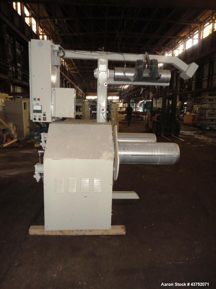 Used Cincinnati Milacron 30" Wide Unwind Stand. (2) Shaft with cantilever design. Able to handle up to 60" diameter rolls, set up for approximately 12" I.D. cores. Serial #2470A01/93-4. Last used wit...
