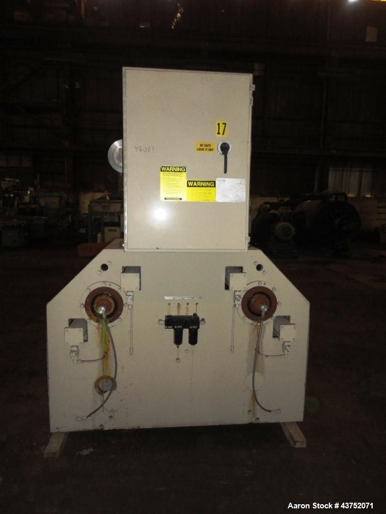 Used Cincinnati Milacron 30" Wide Unwind Stand. (2) Shaft with cantilever design. Able to handle up to 60" diameter rolls, set up for approximately 12" I.D. cores. Serial #2470A01/93-4. Last used wit...