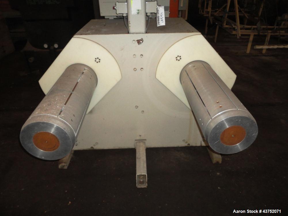 Used Cincinnati Milacron 30" Wide Unwind Stand. (2) Shaft with cantilever design. Able to handle up to 60" diameter rolls, set up for approximately 12" I.D. cores. Serial #2470A01/93-4. Last used wit...