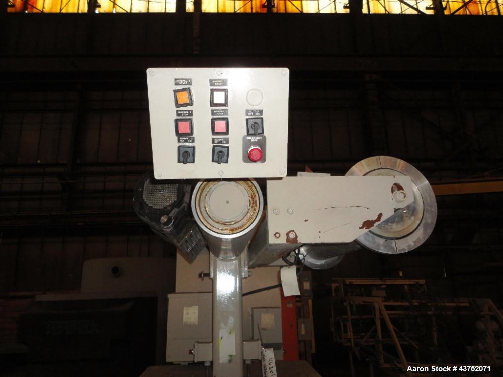 Used Cincinnati Milacron 30" Wide Unwind Stand. (2) Shaft with cantilever design. Able to handle up to 60" diameter rolls, set up for approximately 12" I.D. cores. Serial #2470A01/93-4. Last used wit...