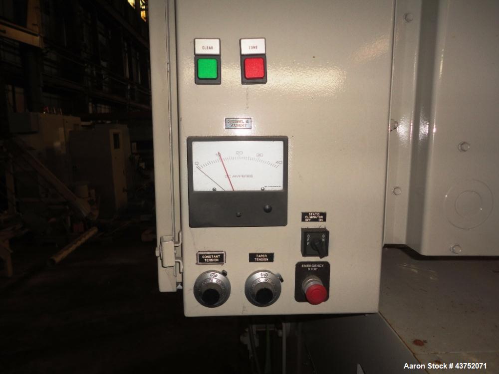 Used Cincinnati Milacron 30" Wide Unwind Stand. (2) Shaft with cantilever design. Able to handle up to 60" diameter rolls, set up for approximately 12" I.D. cores. Serial #2470A01/93-4. Last used wit...