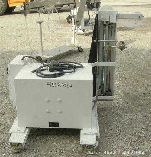 Used Davis Electric 18" Payoff, model MPO-18. Includes dancer and foot pedal jog. 17" shaft length. Driven by an approximate 1/4 hp motor.
