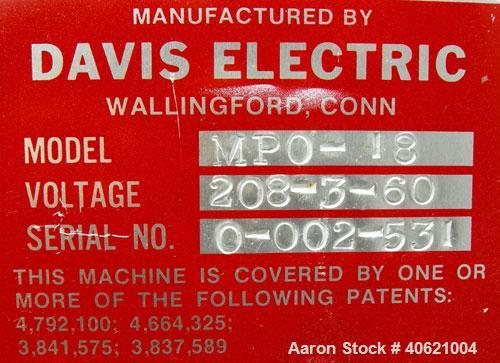Used Davis Electric 18" Payoff, model MPO-18. Includes dancer and foot pedal jog. 17" shaft length. Driven by an approximate 1/4 hp motor.