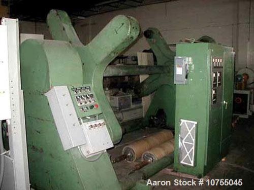 Used Davis Standard / Hobbs Model 4TP4A 72" wide single turret winder having four winding stations able to handle a 60" roll diameter. Each winding station is driven by a 1 hp brushless DC motor with...